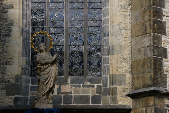 Starred priest statue